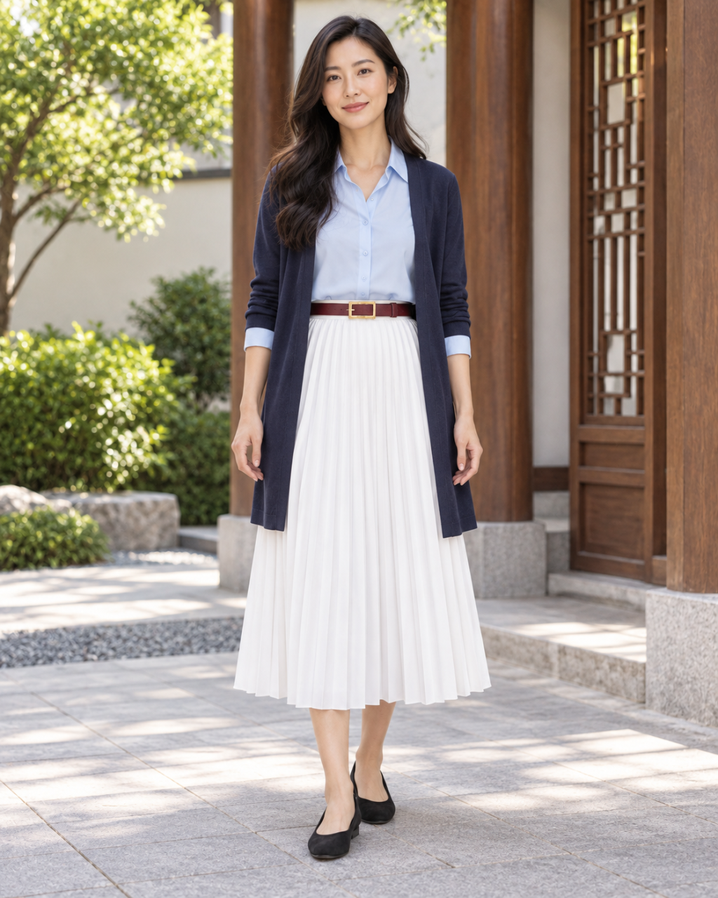 Woman wearing a navy cardigan, light-blue blouse, white pleated skirt, burgundy belt and black flats inspired by Mulan’s palace outfit.