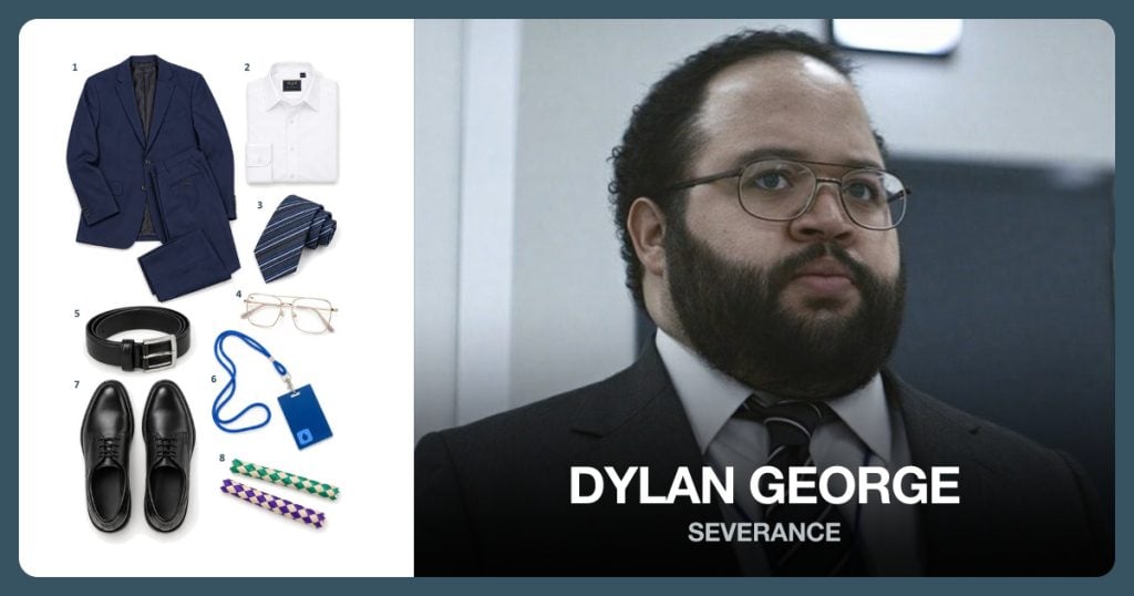 Navy Two-Piece Suit, White Dress Shirt, Blue Striped Tie and Gold Metal Glasses beside Dylan George