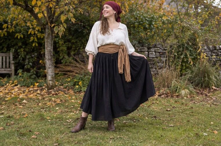 Pirate outfit with a cream blouse and dark skirt