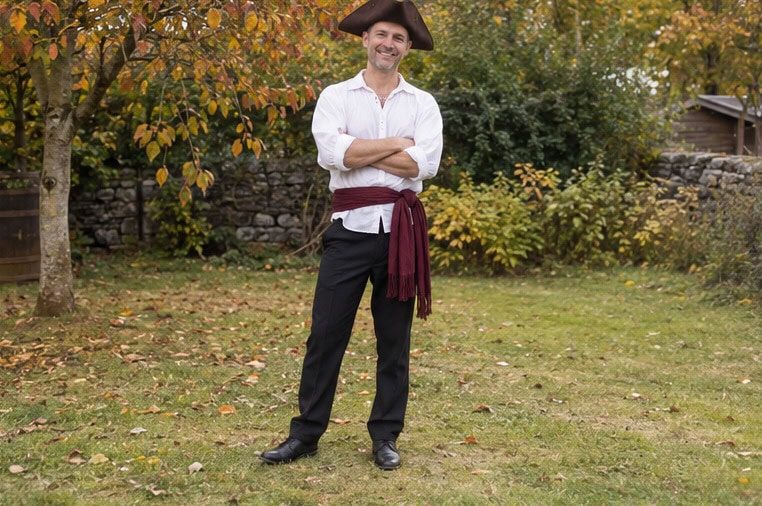 Last-minute pirate with a white shirt and dark trousers